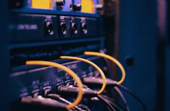 ethernet cables plugged on a server rack