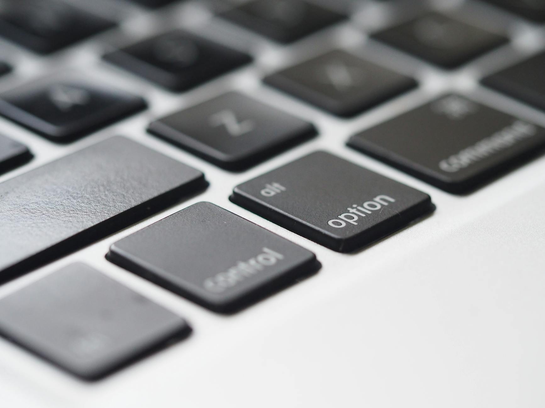 close up photography of macbook keyboard